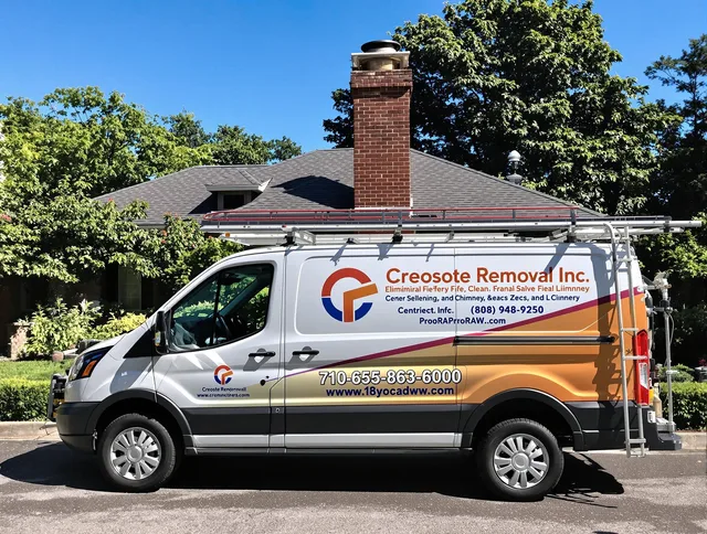 Huntington Park Chimney Sweep technician removing creosote safely in Huntington Park, CA